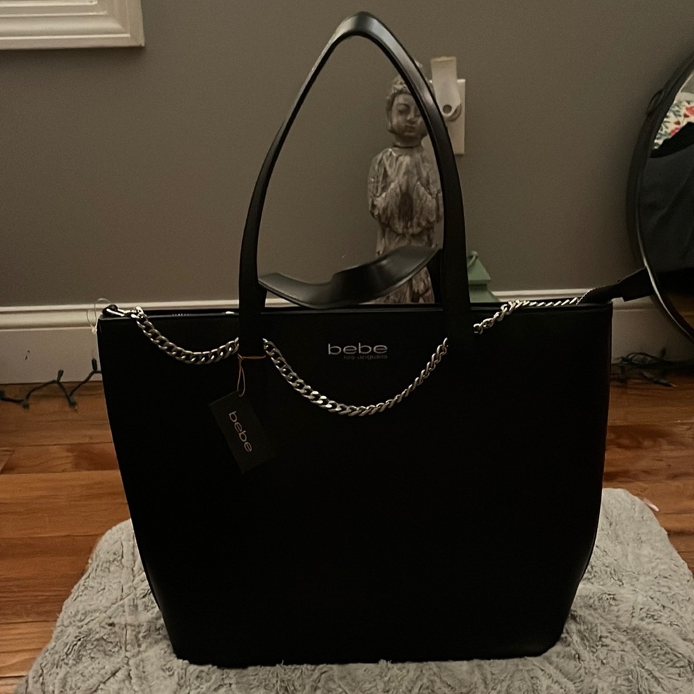 An amazing black spacious bebe handbag